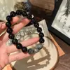 Pulsera de Obsidiana 2025 Nueva Pulsera para Hombre Campana Pulsera de Pareja para Mujer Lujo Ligero Nicho Exquisita Gama Alta
