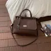 Bolsa de Mão Retro Estilo Coreano para Mulheres 2026 Nova Moda Simples Bolsa de Ombro/Axila Casual para o Dia a Dia Bolsa Transversal