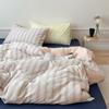 Estilo sem estampa nova versão AB de fio de algodão com agulha perfurada tingido em fio jacquard conjunto de quatro peças de roupa de cama de algodão Nantong têxtil para o lar