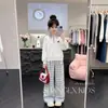 Moda estilo coreano personalidade tendência gola polo moletom xadrez casual calça de perna larga conjunto de duas peças para meninas na primavera e no outono