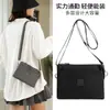 Bolsa de Ombro Personalizada Bolsa Feminina Casual Cor Sólida Bolsa Transversal Casual Bolsa de Nylon Casual Mão Nova Bolsa de Máquina Transfronteiriça