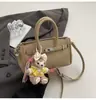 Bolso de platino simple y lujoso para mujer, nuevo y moderno 2026, bolso de hombro cruzado casual a la moda, bolso versátil para el día a día