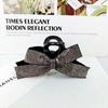 2024 nuevo nombre de Corea del Sur cálido clip de agarre de lazo de diamantes completo para mujer lujo ligero clip de tiburón trasero horquilla grande accesorios para el cabello