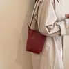 Bolso de mano de alta gama con patrón tejido retro para mujer, lindo nuevo bolso de moda para el trabajo, de hombro, cruzado, pequeño y adorable para el teléfono