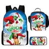 Mochila Escolar Infantil Monstruo de Pelo Verde Grinch Mochila para Estudiante de Primaria Bolsa de Comida Estuche para Lápices Mochila de Tres Piezas Venta al por Mayor Transfronteriza
