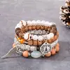 Bestseller transfronteiriço: Pulseira com pingente de asa da Torre Eiffel estilo boêmio, pulseira de contas com cordão elástico multicamadas