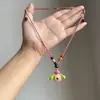 Collar Casual de Cuerda Trenzada con Cuentas de Corazón Largo para Mujer 2025 Nuevo Estilo Étnico Retro Diseño de Nicho Cadena para Suéter