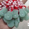 Venta al por mayor de productos de fábrica puesto de jade feria del templo ríos y lagos ambulantes regalo de apertura conmemorativo de viaje roca de cuarzo Jade Guanyin Buda colgante