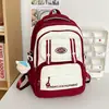 Fabricantes de origen de mochilas escolares 2024 nueva bolsa de tela de nylon impermeable gran capacidad mochila pequeña para estudiante universitario mochila