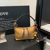Bolso elegante y lujoso de estilo coreano, bolso cruzado sencillo para mujer, nuevo modelo 2026, bolso de hombro texturizado, bolso de gran capacidad para el día a día
