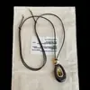 Collar Largo de Cuerda Trenzada con Colgante de Piedra Ojo de Tigre Ovalado Marrón Geométrico Forma de Gota de Agua para Mujer Retro Lujo Accesible Cadena para Suéter