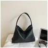 Bolsa de Mão Retro Fashion Nova Outono 2026 Transfronteiriça para Mulheres, Bolsa de Ombro Exquisite, Bolsa Tote de Grande Capacidade para o Dia a Dia