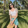 AliExpress Xiaoxiangfeng estilo coreano falda dividida traje de baño para mujer traje de baño para mujer vacaciones junto al mar pantalones de playa para hombre traje de baño para parejas venta al por mayor