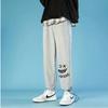 Pierna Pierna Pantalones Casuales para Hombre de Moda Primavera y Otoño Marca de Moda Estilo Hong Kong Cara Sonriente Kuso Pantalones Deportivos Sueltos Pantalones con Cordón para Jóvenes