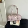 Bolso de axila de lujo ligero para mujer, nuevo bolso de hombro versátil 2026, bolso baguette simple de moda estilo coreano para mujer