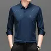 Camisa de manga larga para hombre moda otoño 2023 estilo coreano casual versátil camisa elástica sin costuras para hombres de mediana edad
