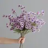 Flor de ciruelo de 5 pétalos cruzada margarita tela de seda flor artificial adorno de decoración para el hogar boda sentido de alta calidad flor de simulación venta al por mayor