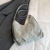 Bolso de gran capacidad para mujer, novedad de verano 2024, bolso de mano de alta gama Sense Niche, mochila de hombro tipo bandolera.