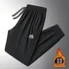 Pantalones casuales para hombre con forro polar para otoño e invierno, pantalones rectos estilo jogger, ajuste holgado con bolsillos, cremallera, pantalones deportivos antirrobo para hombre