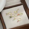 Moda estilo coreano nuevo un tarjetero tres pares pendientes de diseño personalizado conjunto regalo para amigas pendientes de botón de oreja de moda