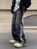 Pantalones de Mezclilla Rayados Negros para Hombre Primavera y Otoño Estilo Retro Americano Pantalones de Tres Rayas High Street Caída Sueltos Rectos