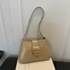 Nuevo modelo de otoño temprano 2026, alto atractivo estético, calidad, moderno, lujo discreto, simple, elegante, versátil bolso de hombro y axila para ventas transfronterizas