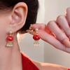 Pendientes Fuzi de perla de imitación con incrustaciones de diamantes rojos de Año Nuevo, elegantes pendientes chinos nuevos para mujer, pendientes de alta gama Sense Niche que combinan con todo.