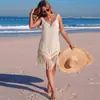 Patchwork de vacaciones transfronterizo colorido crochet borla cuello en V suéter hueco transparente vestido de cobertura de bikini de playa