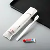 Cepillo de Dientes Desechable para Hotel Cerdas Suaves para Uso en Casa y Huéspedes Artículos de Tocador para Casa de Huéspedes con Set de Pasta de Dientes Venta al por Mayor Empaque de Película Suave