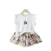 Conjunto de Verano para Niñas 2026 Nuevo Estilo Camiseta de Manga Acampanada para Niños Pantalones de Falda Floral Conjunto de Dos Piezas