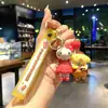Lindo llavero de Sanrio con colgante de muñeco de dibujos animados para coche, accesorios para bolso, adornos colgantes, pequeño regalo al por mayor