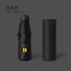 Mini Paraguas Negro con Recubrimiento Resistente a los Rayos UV, Paraguas Plegable Compacto de Bolsillo tipo Cápsula para Estudiantes, Venta al por Mayor