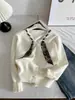 Cárdigan de punto para mujer 2026 otoño e invierno nuevo estilo combinado con un pañuelo de seda, chaqueta adelgazante, top y prenda básica