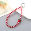 Nueva Cadena de Teléfono Móvil con Perlas de Cristal de Fresa de Diamantes Completos Joyería Colgante Anti-Pérdida para Carcasa de Auriculares Llavero Colgante
