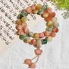 Flor Rara Color Piel Jade-like Material Viejo Bodhi Anillo de Mano Dedo Anular Semilla de Bodhi Suave Wenwan Estudiante Alivio del Estrés Pulsera de Cuentas de Oración Femenina