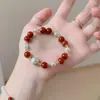 Pulsera Original Nueva de Estilo Chino con Nube Roja y Perlas para Mujer, Pulsera de Perlas de Ágata Roja Imitación para Mujer, Pulsera de Cristal de Lujo Ligero con un Toque de Alta Gama