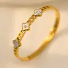Pulsera de Acero de Titanio para Mujer, Simple, al por Mayor, Chapada en Oro, Joyería de Alta Gama, No se Desvanece, Flor de Cuatro Pétalos con Incrustaciones de Diamantes