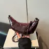 Bolsa de axila da moda, bolsa única estilo coreano bolinho, novo modelo de verão 2026, bolsa de ombro transversal casual simples de cor sólida