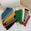 Versión coreana de chal pequeño de punto liso para niños, lana exterior, chaleco pequeño simple de moda, capa a prueba de frío, moda