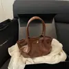 2026 Bolso Nuevo de Moda y Versátil con una Textura Elegante, Bolso de Hombro Cruzado Único, Diseño de Nicho, Bolso Cubo Casual para Mujer