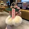 Suerte Colgante de Peluche de Caqui Llavero Adorno Caqui Suerte Colgante para Coche Adorno de Piel Sintética de Conejo Regalo