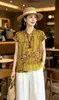 Verano 2026 Nuevo Estilo Cuello Alto Botonadura Diagonal Brocado de Seda Brillante Retro Diseño de Botones Manga Acampanada Elegante Top Corto