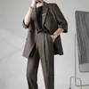 Traje casual de manga corta para hombre, estilo nuevo de primavera y verano, versión coreana juvenil, blazer casual holgado de moda de tres cuartos