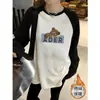 Camiseta de Manga Larga con Contraste de Color Distintivo Europeo para Mujer Otoño e Invierno 2024 Nueva Camisa Base Larga Holgada de Manga Raglán