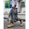Shorts cortos de mezclilla desgastada con estampado de rayo estilo callejero americano para hombres y mujeres, de alta costura, por encima de la rodilla, de longitud media, holgados, de pierna ancha, modernos