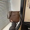 Bolsa Saco de Luxo Estilo Retrô Feminina Casual 2026 Nova Moda Versátil Ombro Único para o Dia a Dia Transversal Simples Alta Aparência