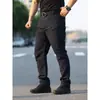 Calças Táticas Ix5 Masculinas para Uso Externo Corte Amplo Múltiplos Bolsos Resistentes ao Desgaste Calças para Tarefas Especiais Calças de Trabalho Masculinas Multiuso Camuflagem Cp