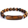 Pulsera Elegante de Piedra Ojo de Tigre para Hombres Diseño Único con Cuentas Marrones y Acentos de Plata Pulida Cordón Elástico Duradero para un Ajuste Cómodo Ideal para Uso Casual y Formal Regalo Perfecto para Él