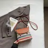 Bolsas de Moda Transfronterizas Este Año: Nuevos Modelos de Verano 2026, Bolsos de Hombro Texturizados de Nicho, Bolsos Cruzados Tipo Cubo Versátiles con Bloques de Color