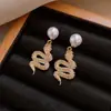 Brincos Pingente Gota d'Água Agulha de Prata Moda Retrô Versáteis Brincos de Tarraxa Luxo Leve Brincos de Alta Qualidade com Senso de Design Nicho